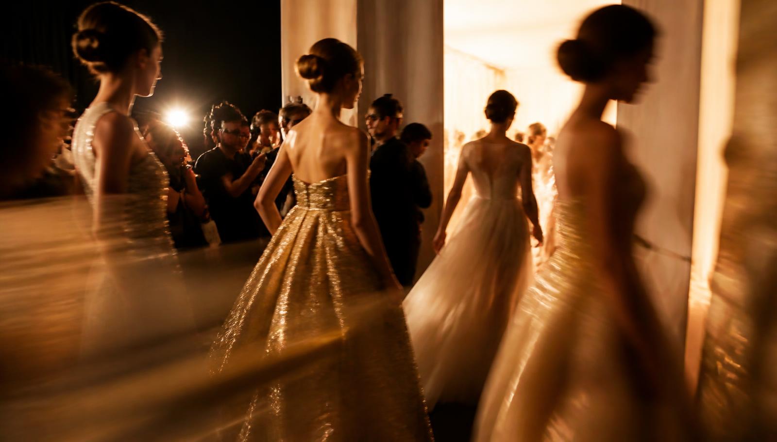 Backstage at a couture runway show